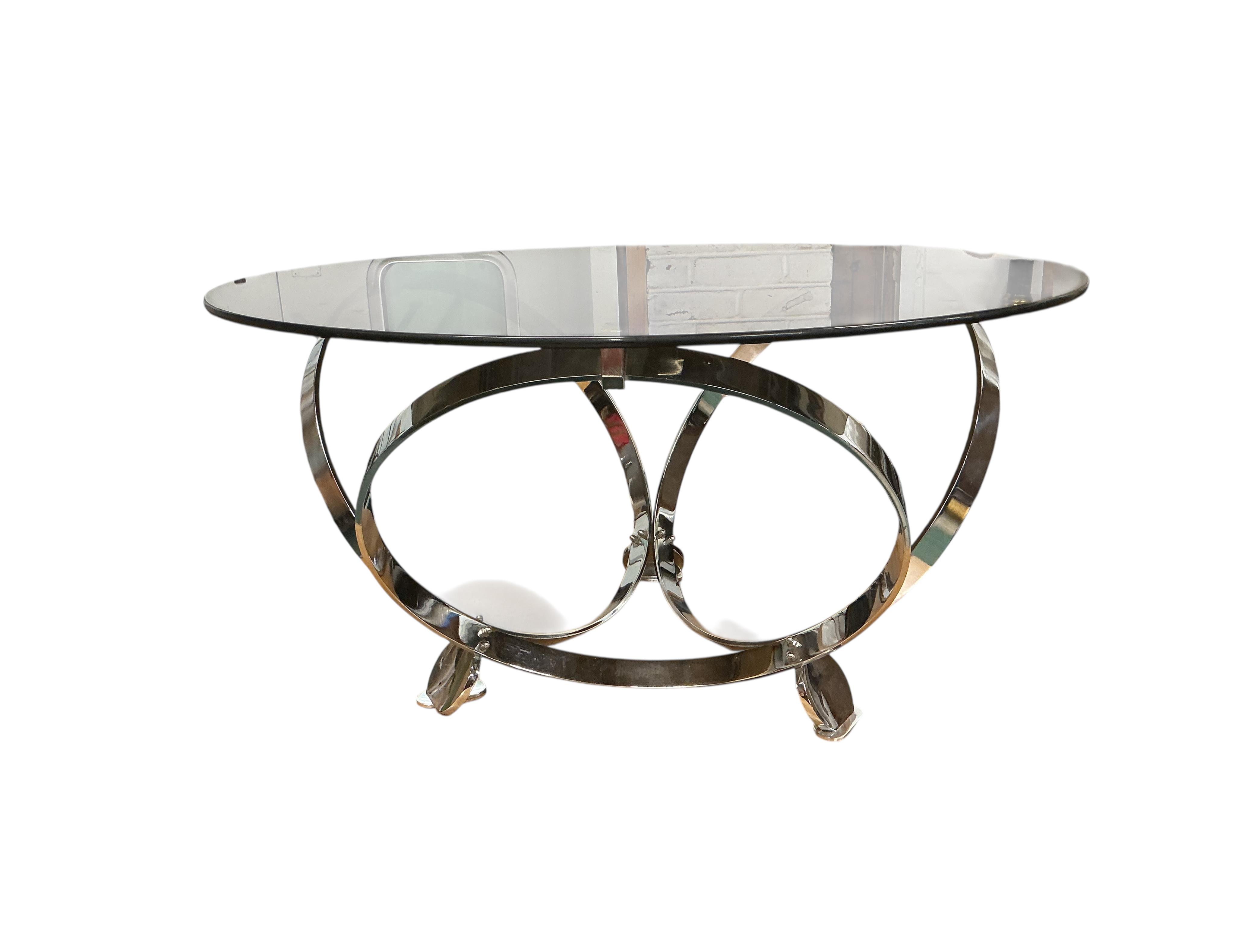A 1960's KNNT Hesterberg circular chrome and glass top coffee table, diameter 100cm, height 52cm